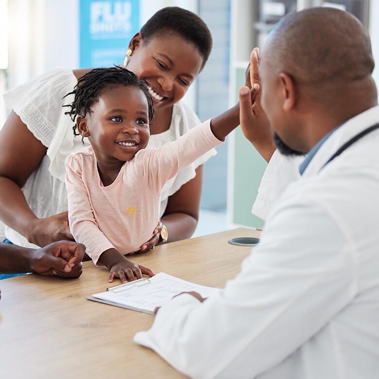 High five, doctor and family with a girl and her parents at the hospital for consulting, appointment and healthcare. Medicine, trust and support in a medical clinic with a health professional High five, doctor and family with a girl and her parents at the hospital for consulting, appointment and healthcare. Medicine, trust and support in a medical clinic with a health professional